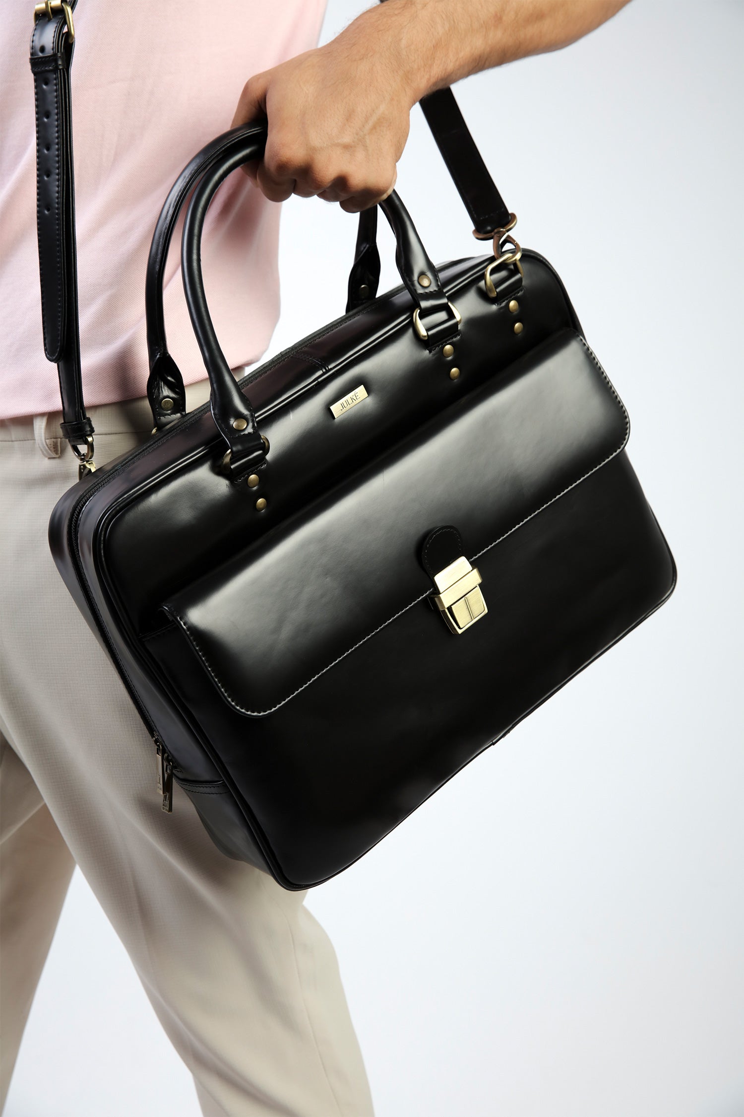 Leather laptop bag in black colour with glossy finish by JULKE