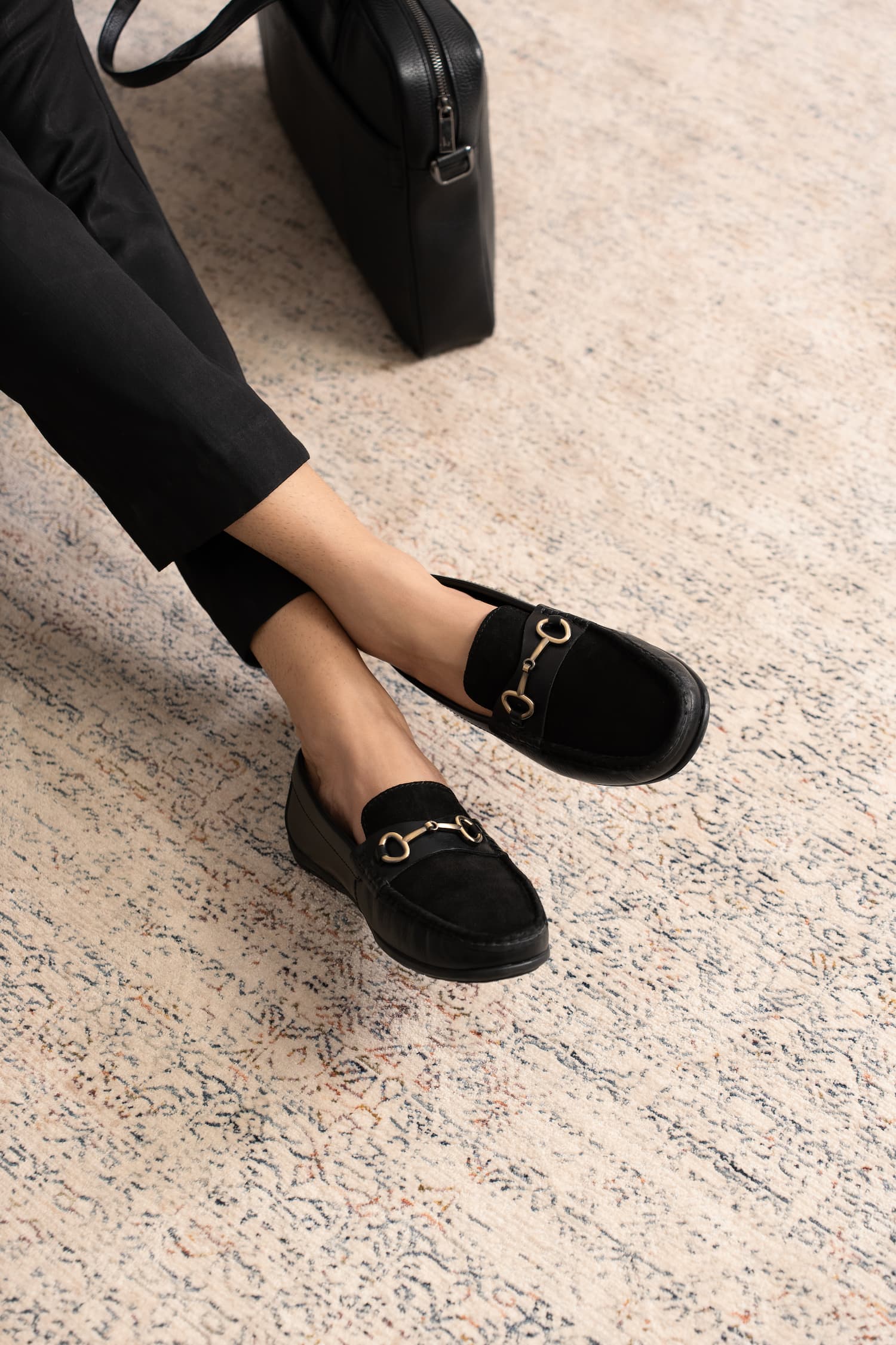 Mens suede and leather moccasins in black colour with metallic light gold horsebit buckle by JULKE.