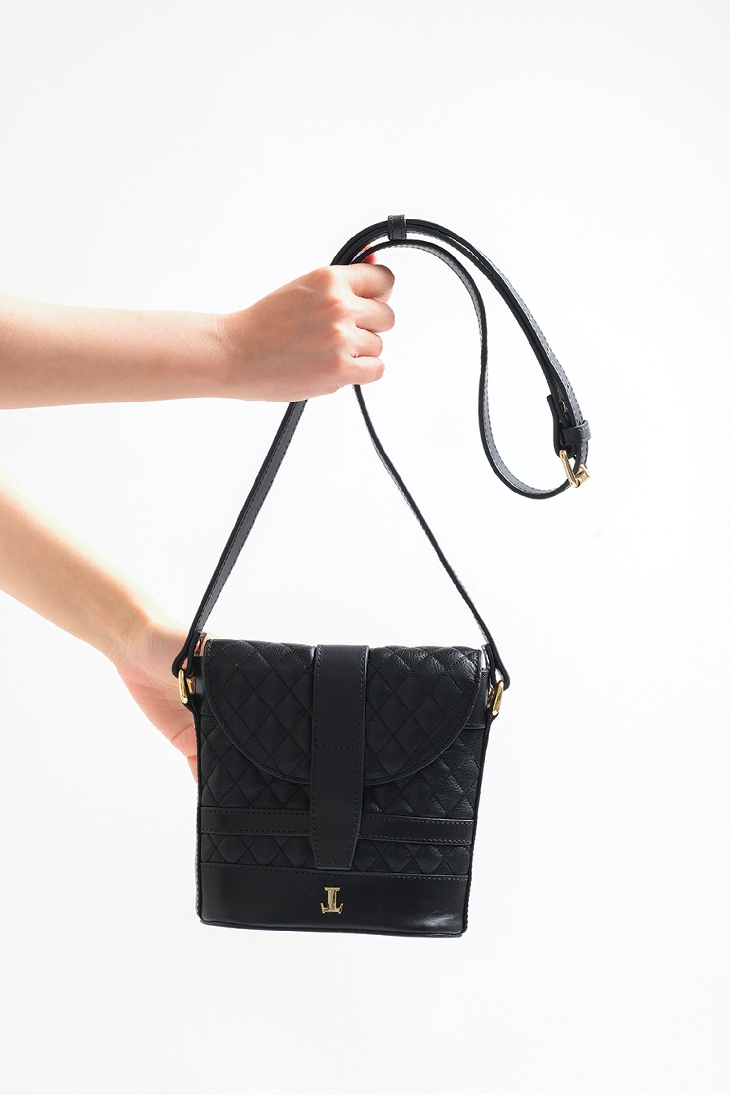 Womens leather shoulder bag small in black colour with quilting and long shoulder strap by JULKE