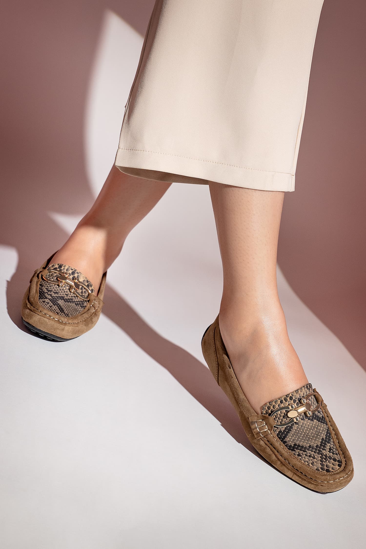 Womens leather moccasins in light brown colour with replile texture vamp and metallic gold D-buckle by JULKE.