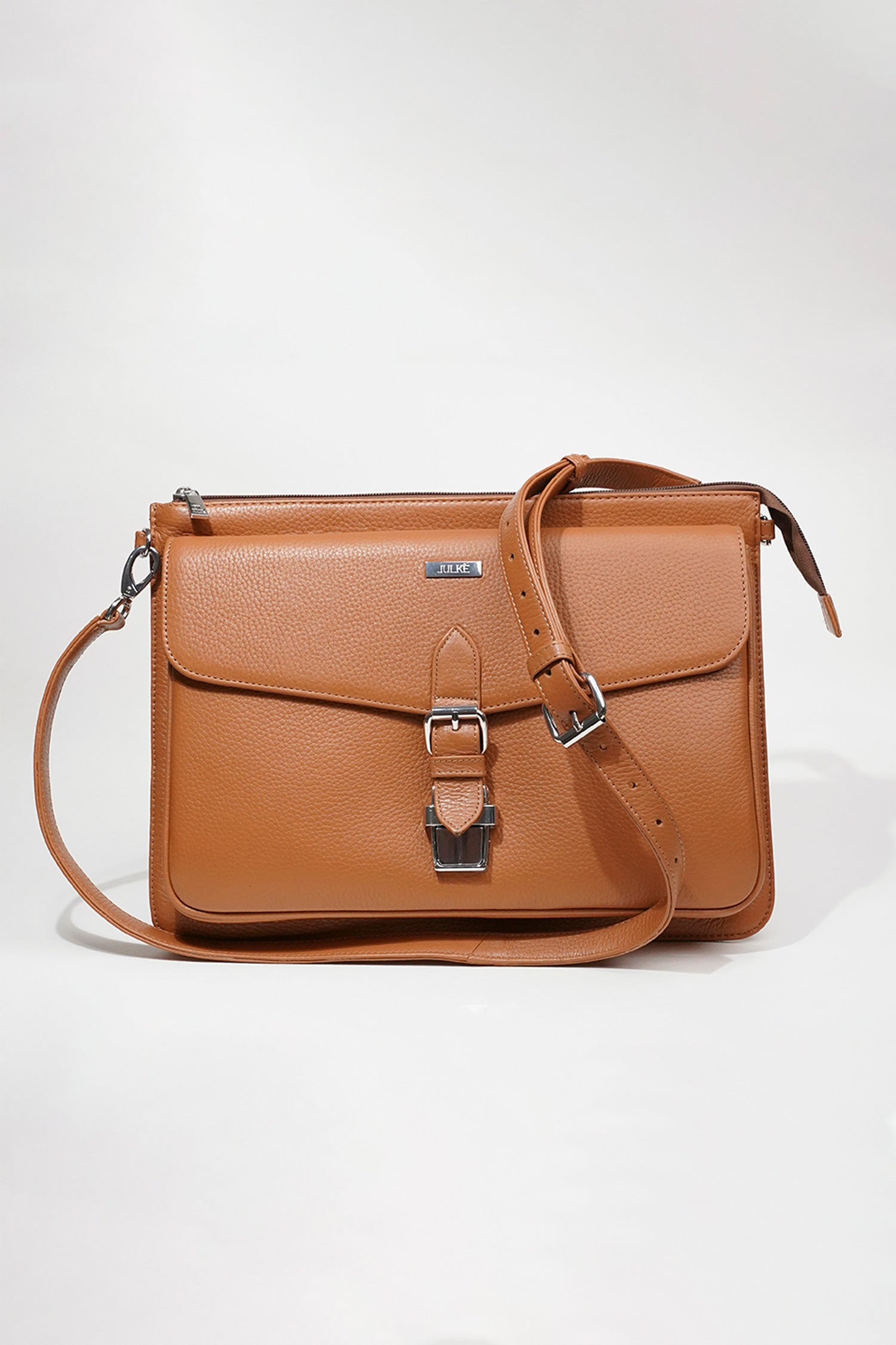 Leather laptop sleeve in tan colour with shoulder strap by JULKE