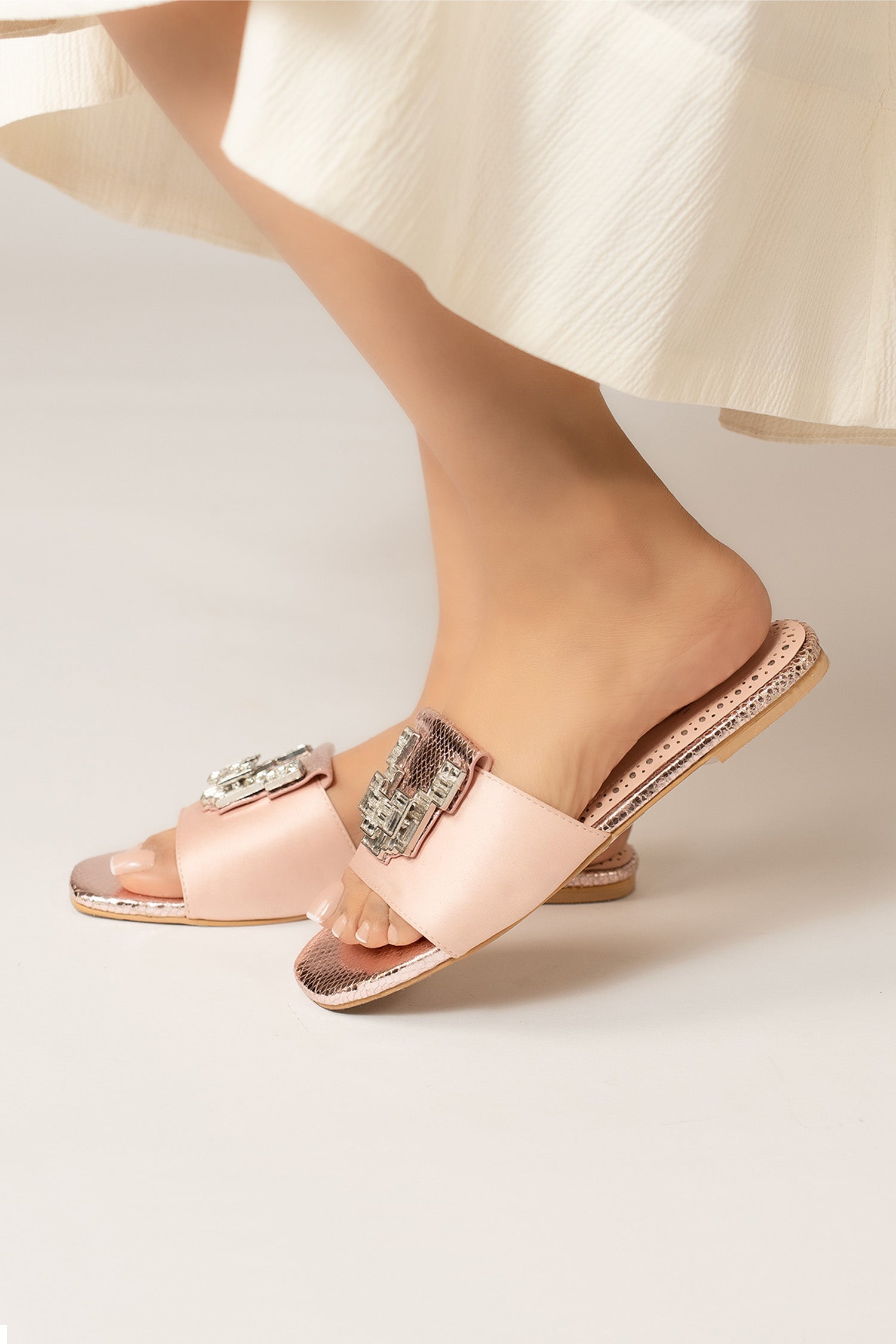 Womens festive flat shoes in light pink colour with silver croc texture leatherite on satin strap and geometric silver rhinestone brooch by JULKE.