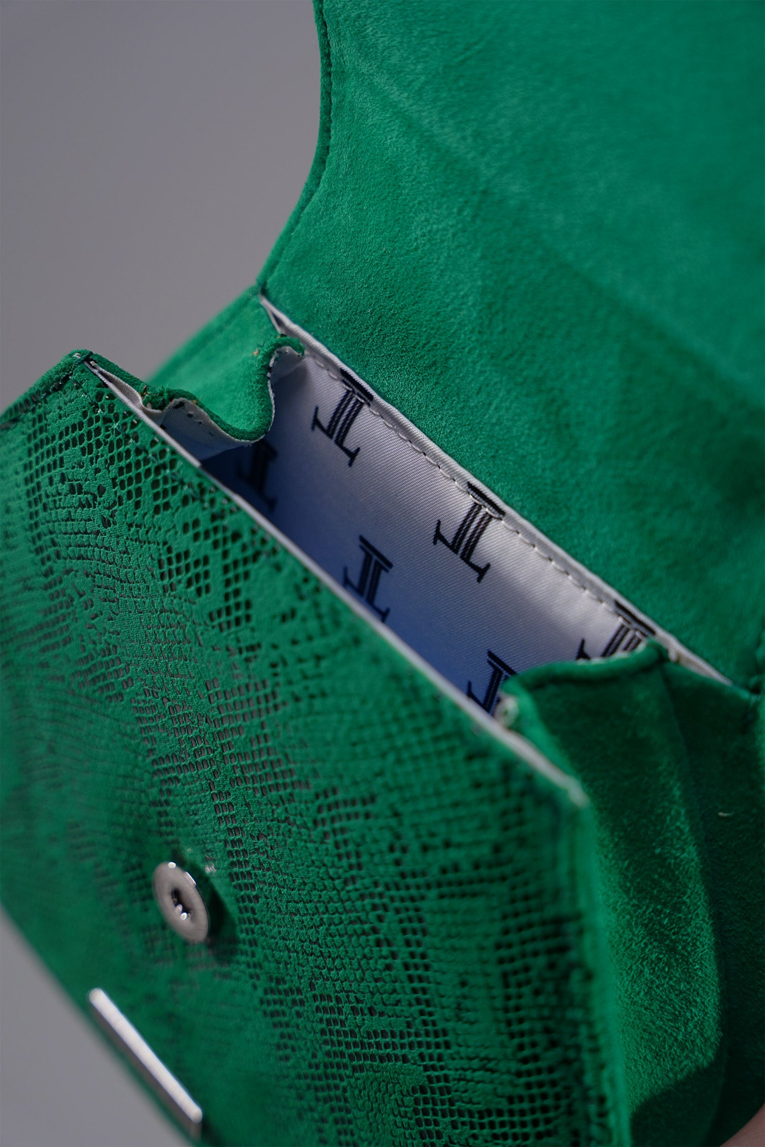 Womens leather bag in green colour with snake print by JULKE