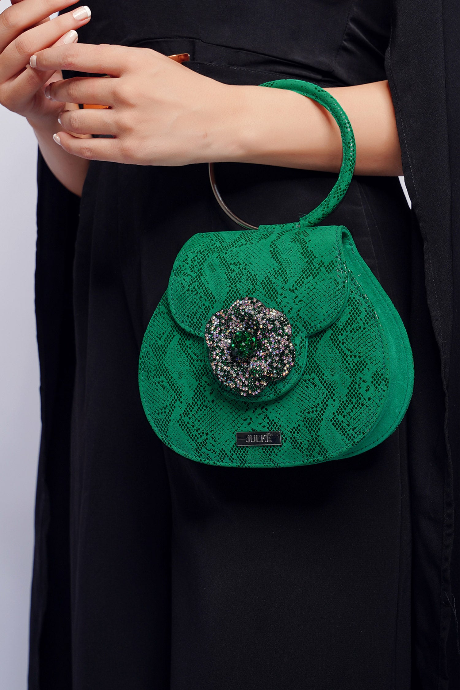 Womens leather bag in green colour with snake print by JULKE