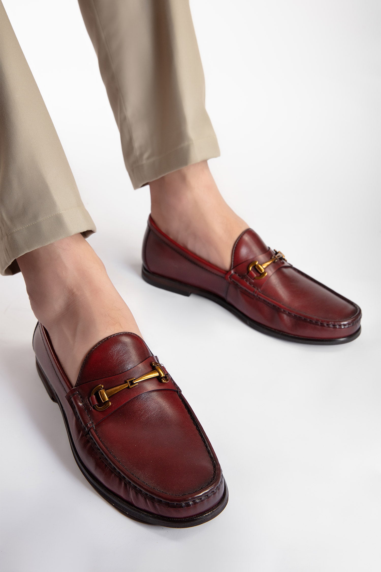 Mens leather moc shoes in dark red colour with gold horse-bit buckle by JULKE