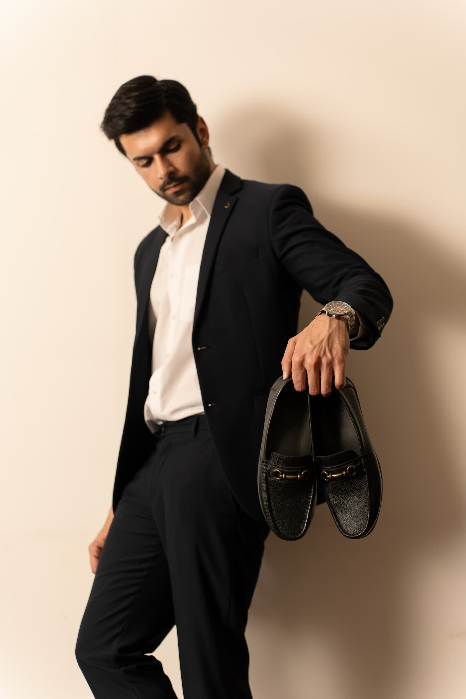 Mens Milled grain leather moccasins in black colour with metallic antique gold horsebit buckle by JULKE.