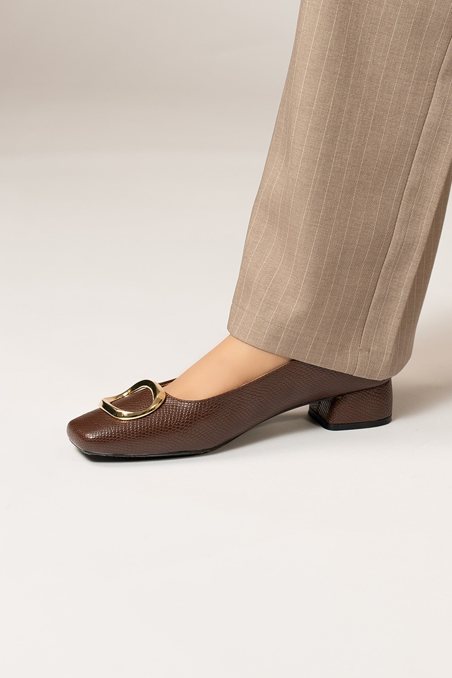 Womens square toe block heels in dark brown colour with reptile texture and metallic gold oval shaped buckle by JULKE.