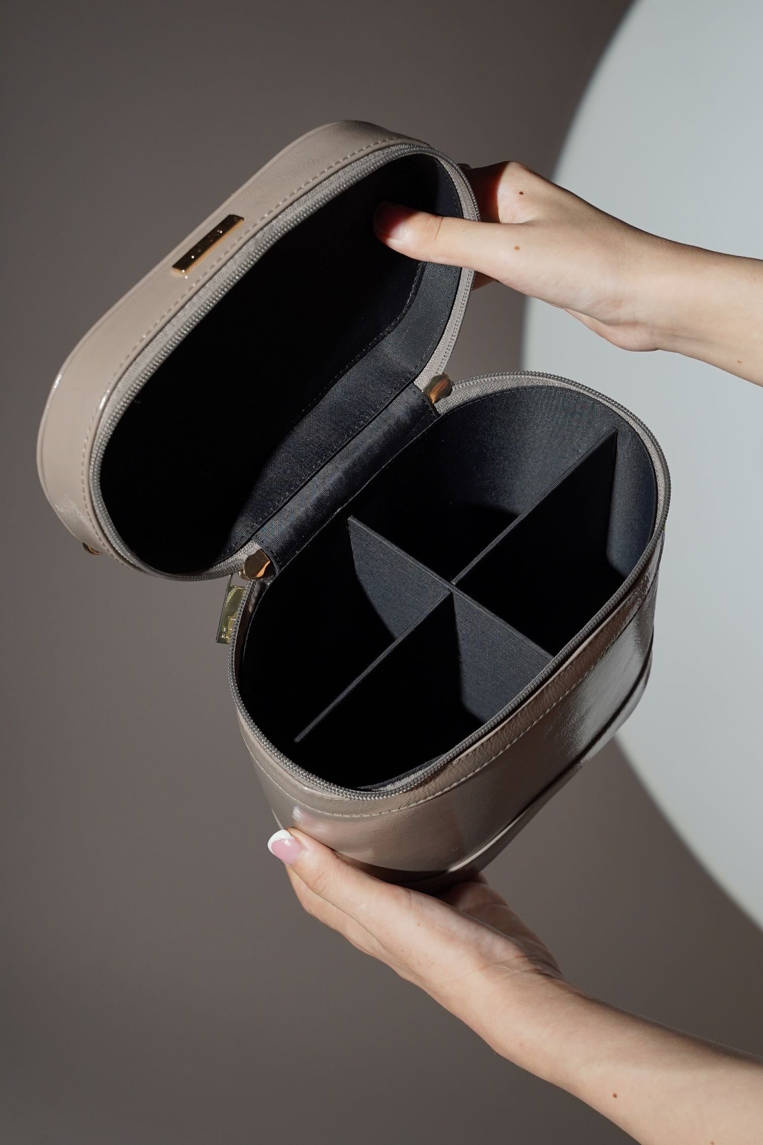 Women's leather cosmetics vanity trunk in grey colour with gold metallic chain handle by JULKE