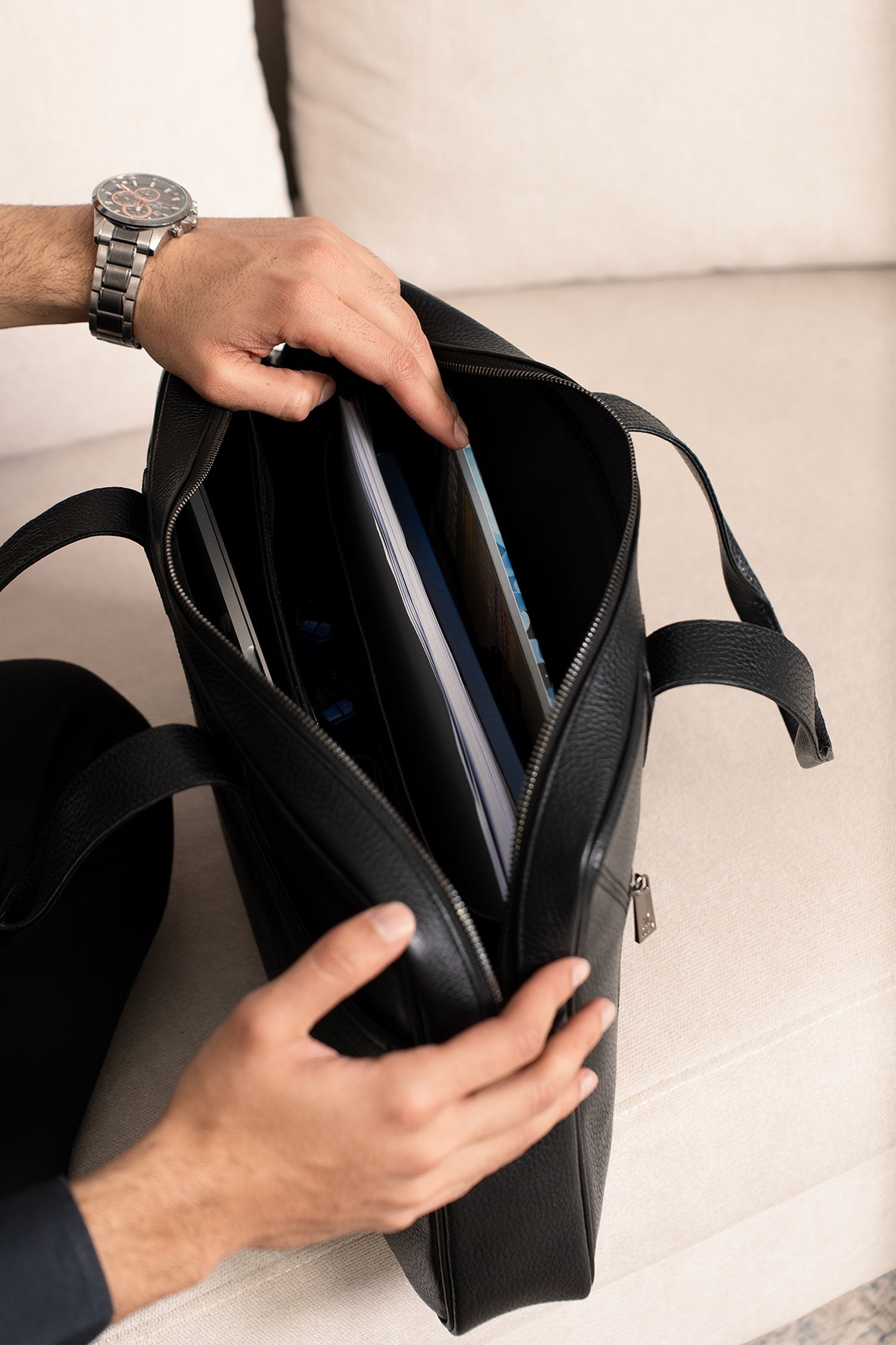 Mens soft leather laptop bag in black colour with turquoise leather stripe in front and metallic grey hardware by JULKE.