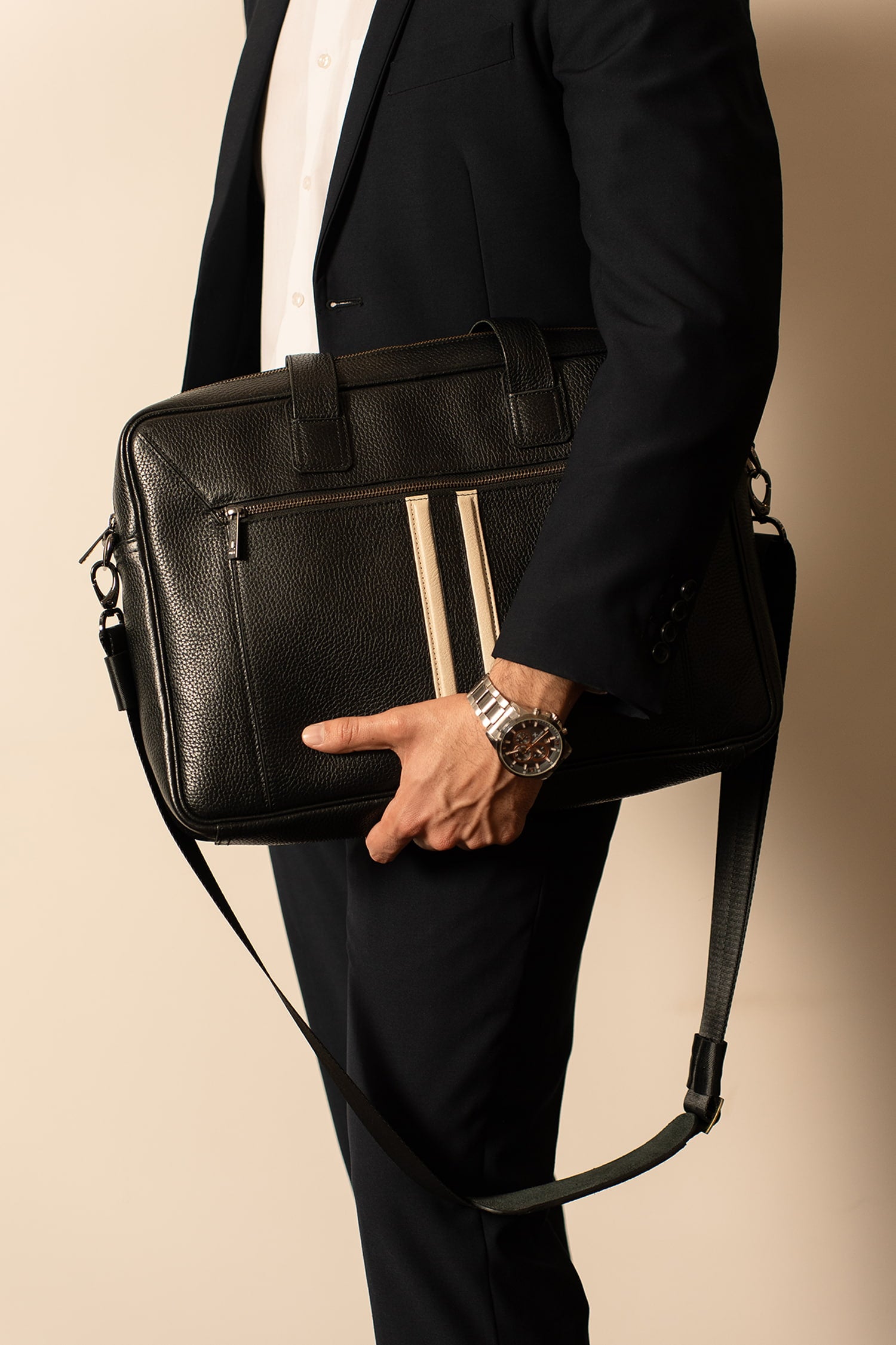Mens soft leather laptop bag in black colour with off white leather stripe in front and metallic grey hardware by JULKE.