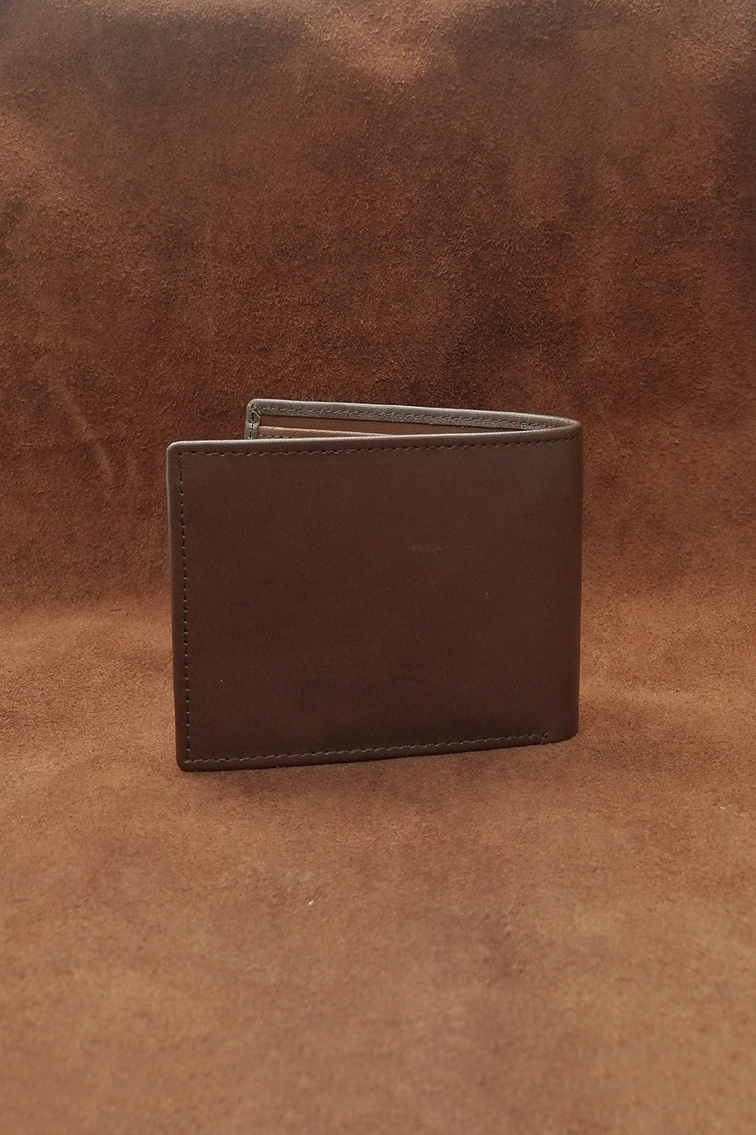 Mens leather bifold wallet in dark brown colour with contrast stitching and gold metallic brand trims by JULKE