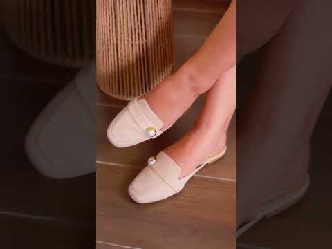 Womens leather mules in light beige colour with pearl buckle by JULKE.