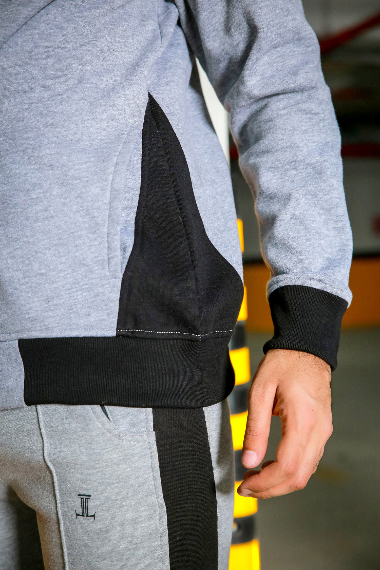 Mens winter hoodie in light grey colour with black accents by JULKE.