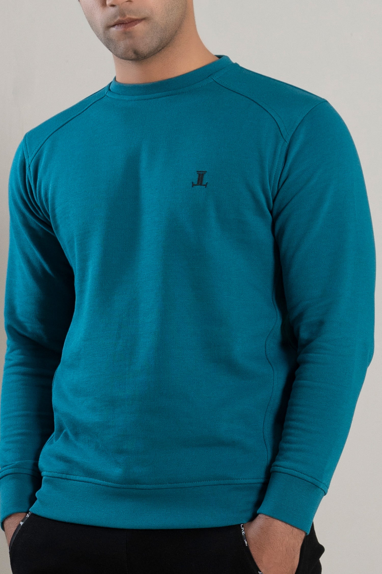 Mens winter sweatshirt in turquoise blue colour with fleece lining by JULKE.