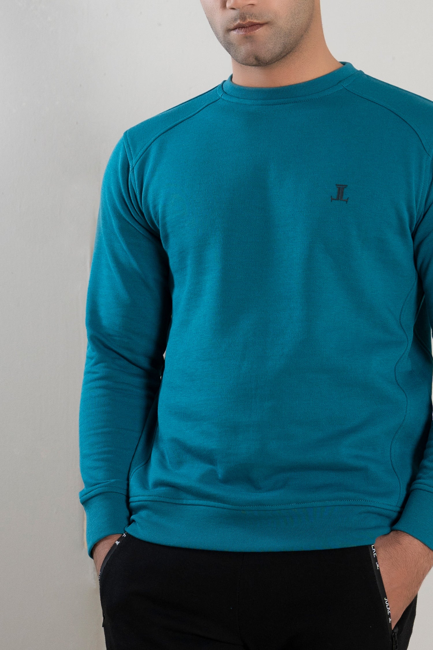 Mens winter sweatshirt in turquoise blue colour with fleece lining by JULKE.