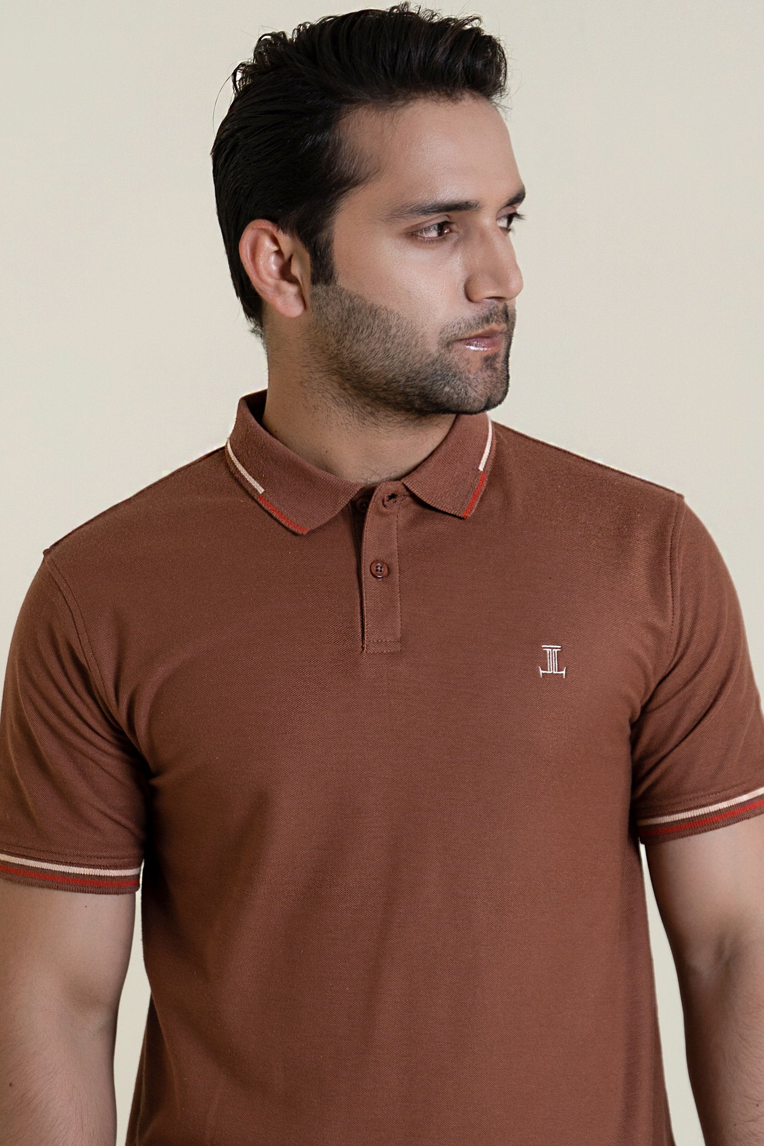 Mens polos shirt in brown colour with red and wwhite tipped sleeves and collar by JULKE.