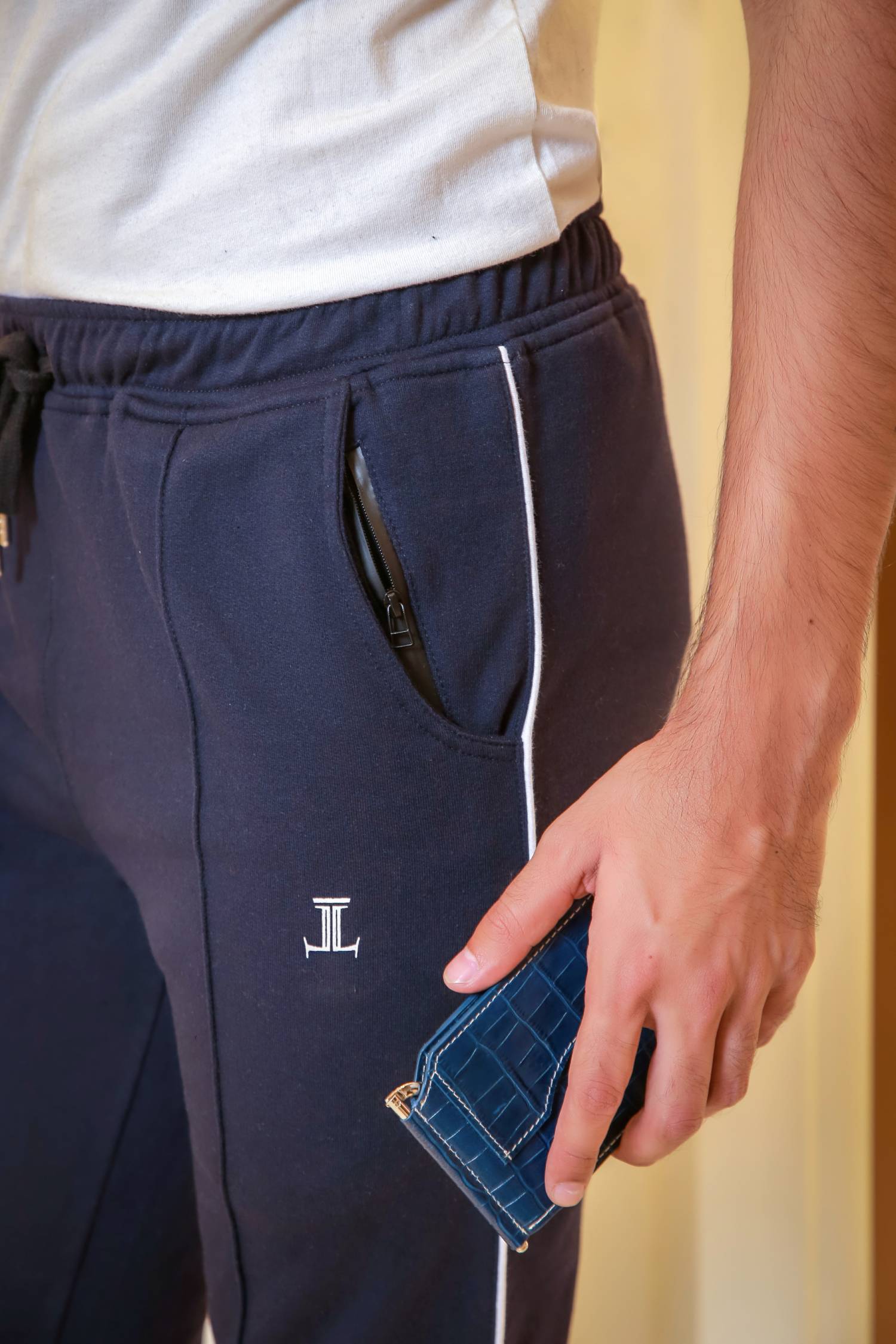 Mens winter sweatpants joggers in navy blue with white piping by JULKE
