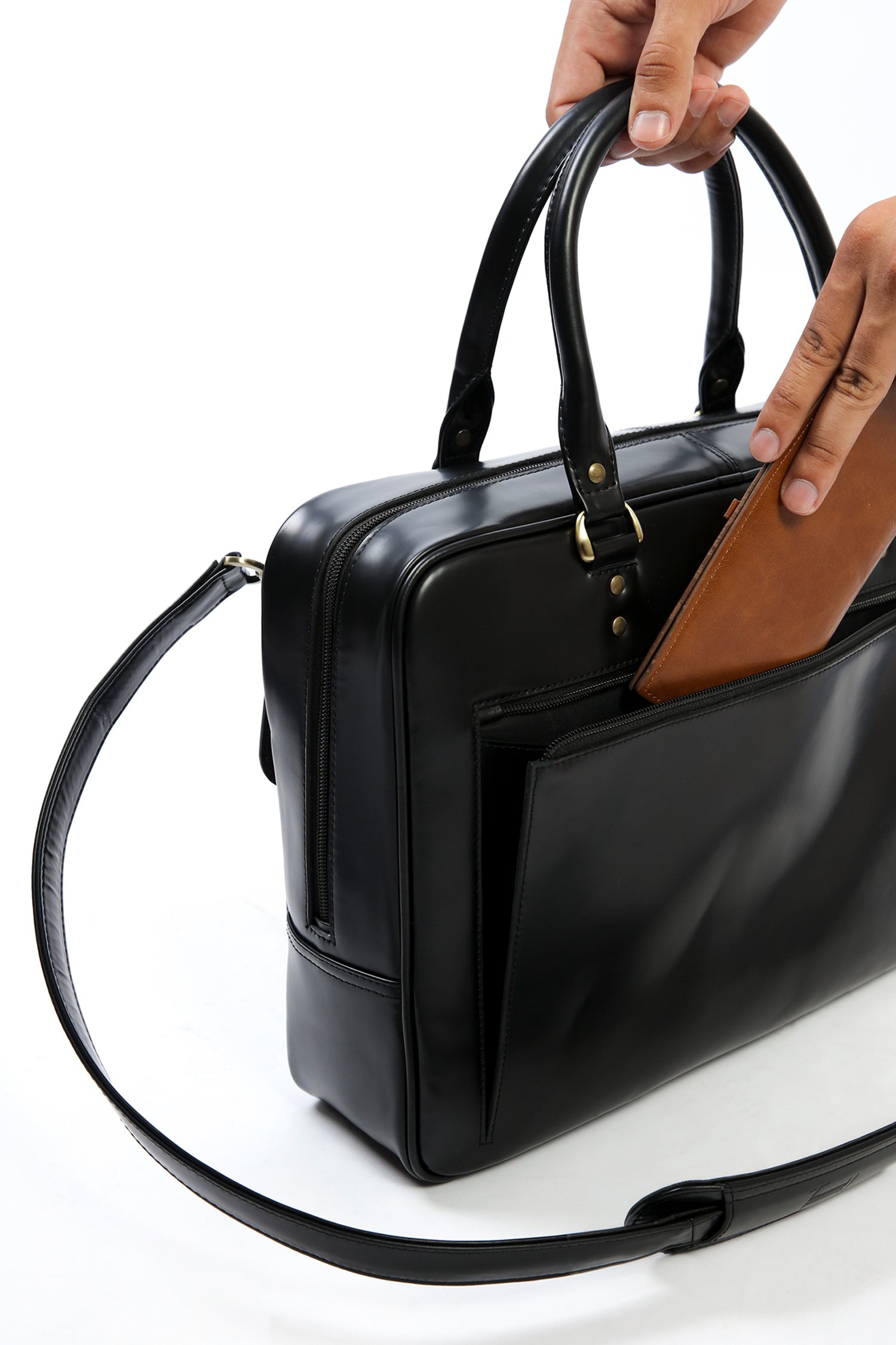 Leather laptop bag in black colour with glossy finish by JULKE