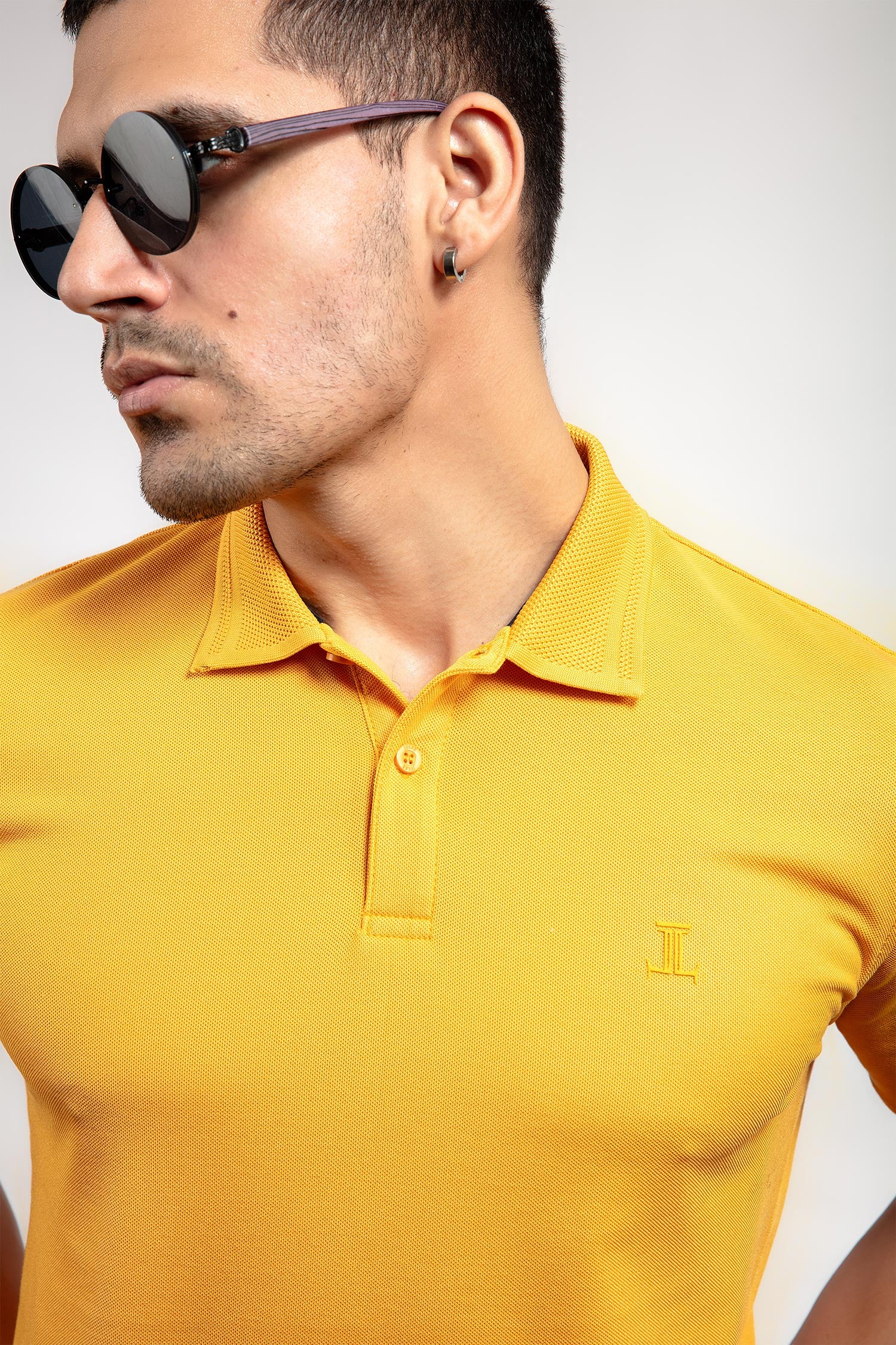Mens summer polo shirt in yellow colour with matching tipped collar and half sleeves by JULKE.