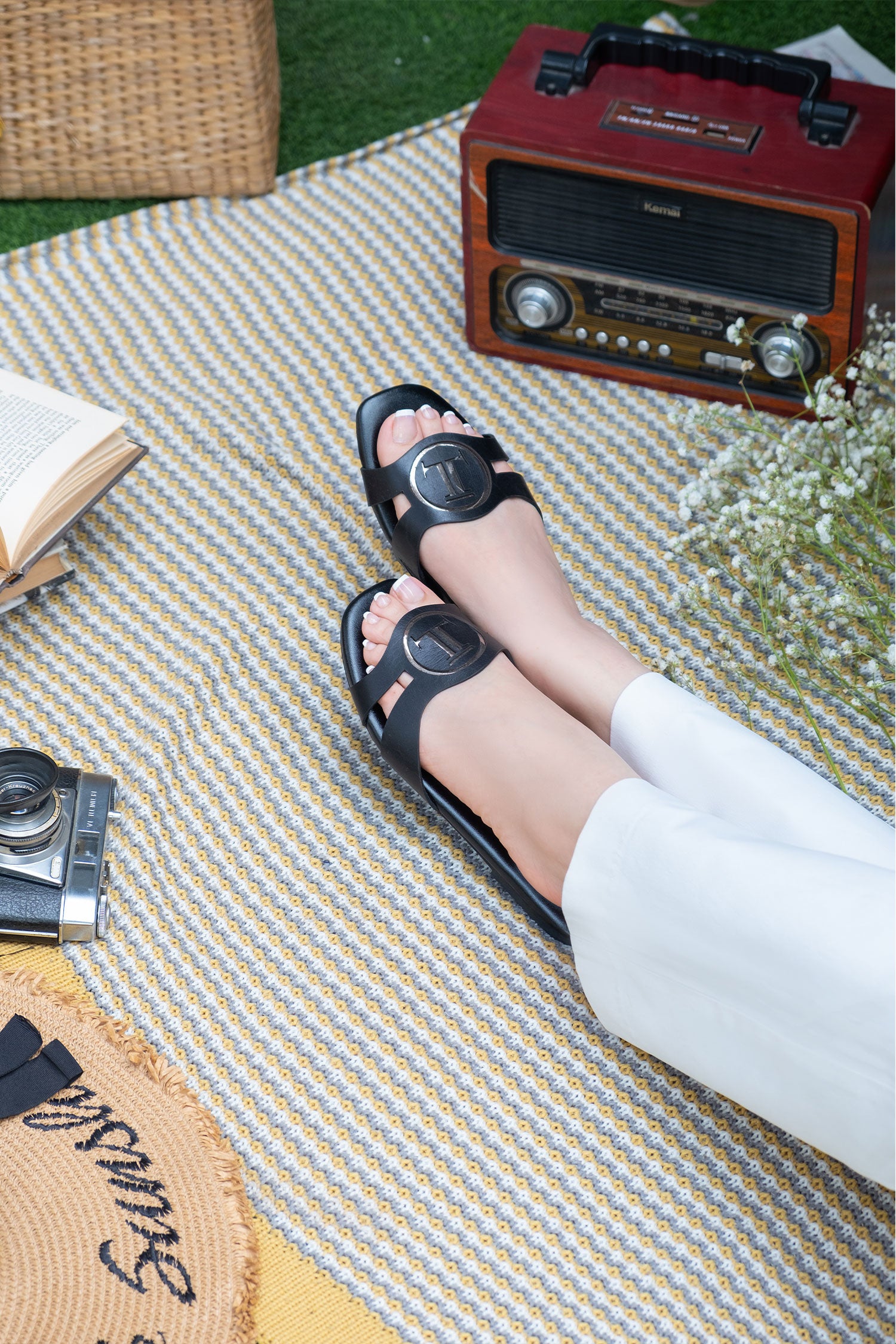 Women summer leather flats in black colour with laser cutting and side elastic by JULKE 