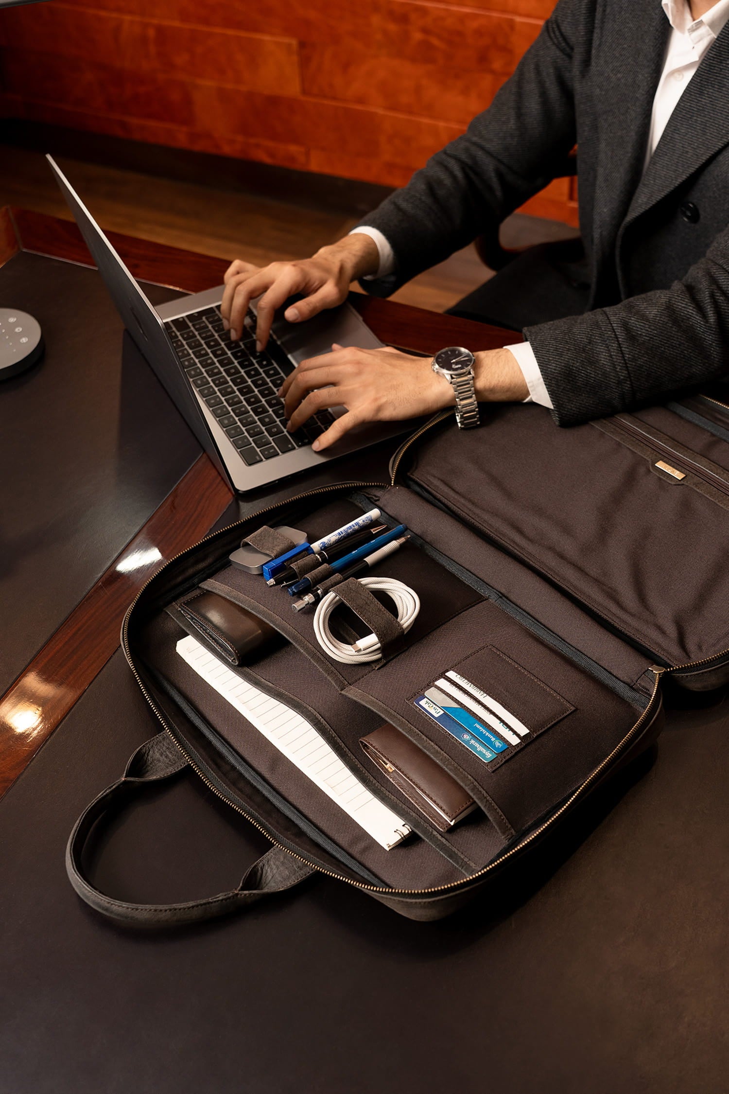 Mens nubuck leather laptop bag in dark brown colour with frotn contrast stitch and detachable shoulder strap by JULKE. 