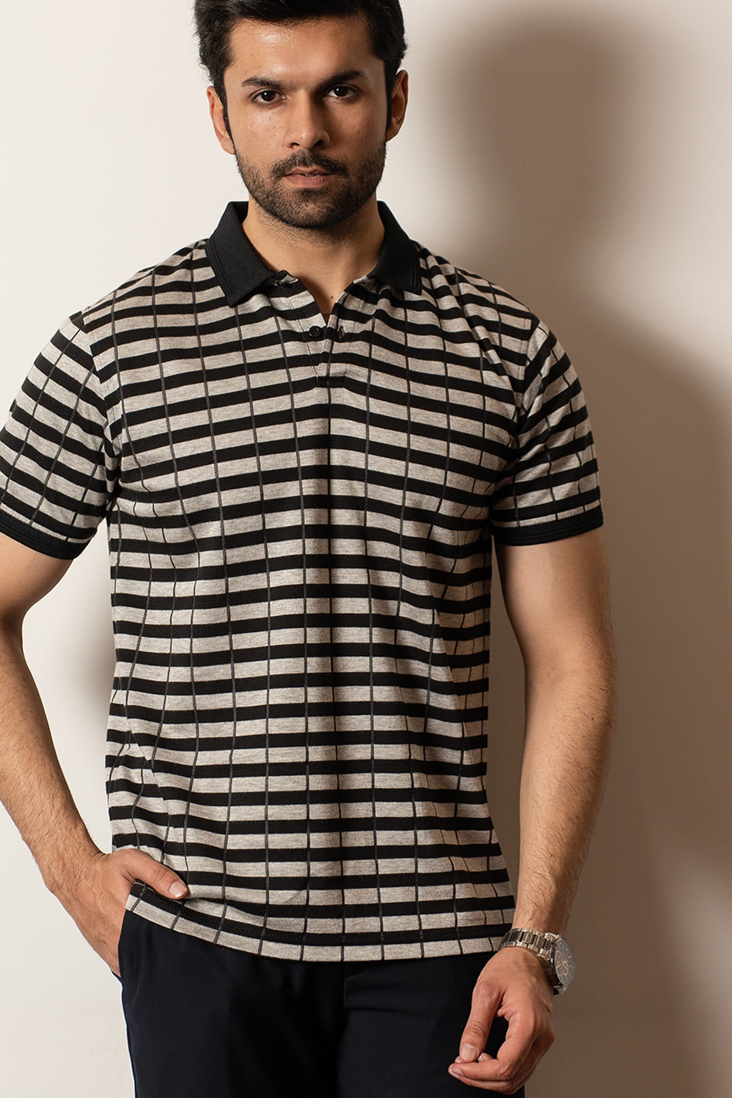 Mens half sleeve polo shirt in black and beige stripes with black collar and sleeve cuffs by JULKE. 