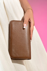 Women's leather long wallet in brown colour with zipper closure contrast stitch and metal brand logo by JULKE. 