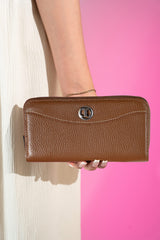 Women's leather long wallet in brown colour with zipper closure contrast stitch and metal brand logo by JULKE. 