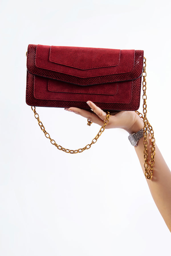 Womens leather shoulder bag in dark red colour with gold chain by JULKE