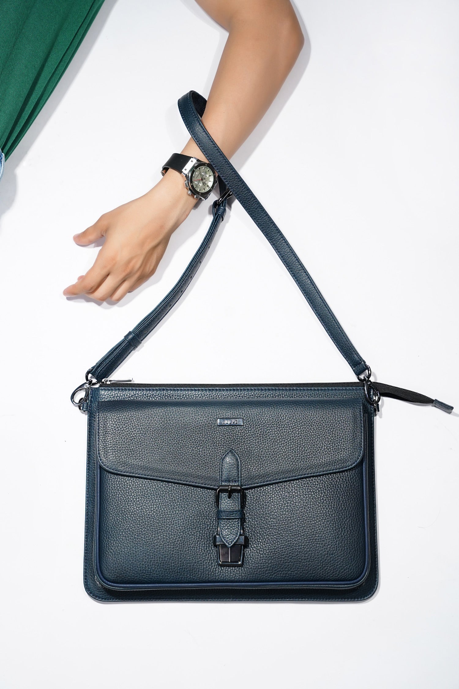 Leather laptop sleeve in navy blue colour with shoulder strap by JULKE