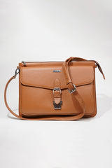 Leather laptop sleeve in tan colour with shoulder strap by JULKE