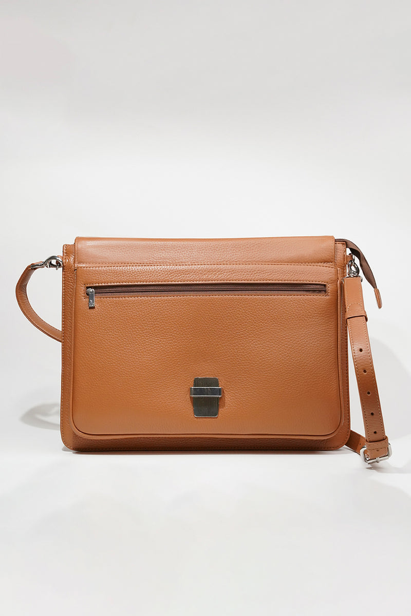 Leather laptop sleeve in tan colour with shoulder strap by JULKE