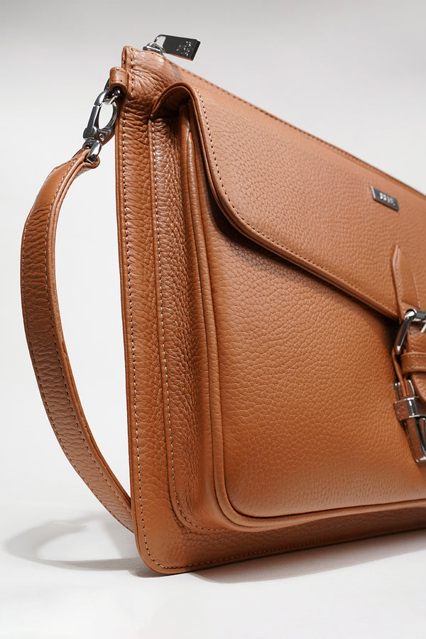 Leather laptop sleeve in tan colour with shoulder strap by JULKE