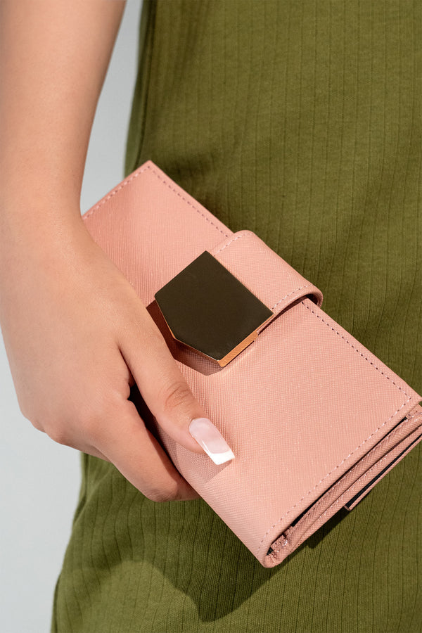 Women's leather long wallet in light pink colour in crosshatch texture with gold metal press button strap and extra pockets by JULKE. 