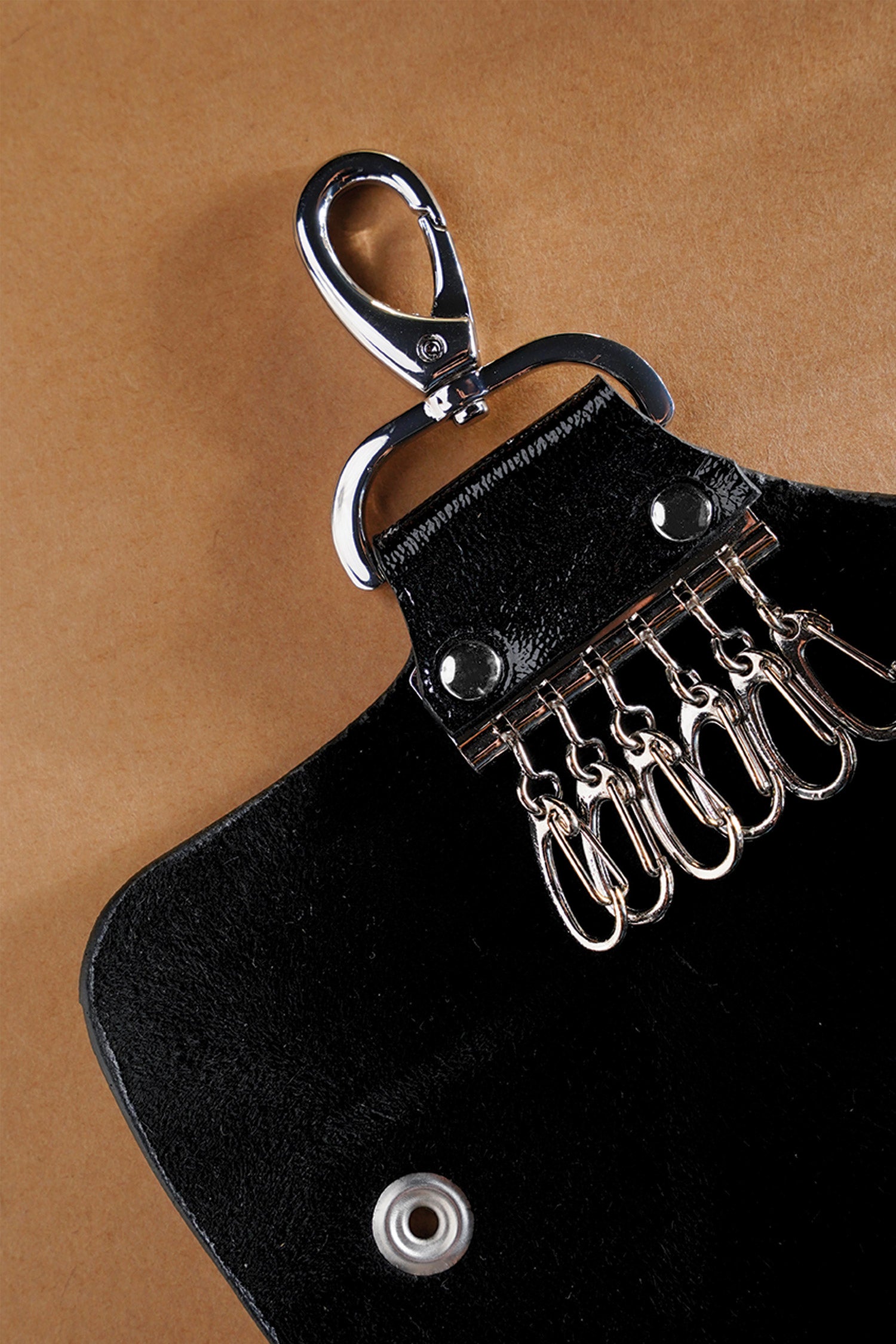 Leather key ring set in glossy black colour with silver metal hook by JULKE