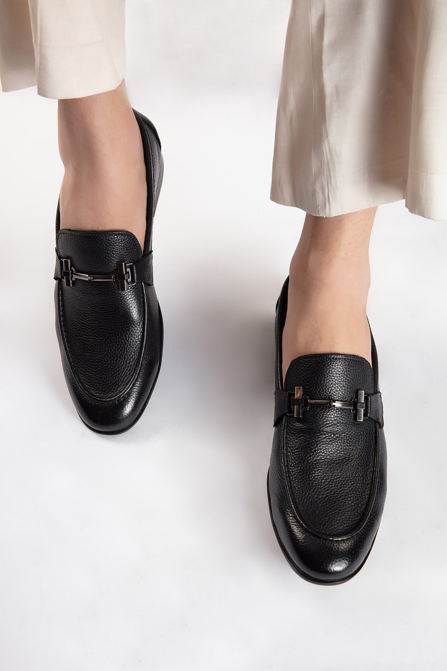 Mens leather round toe slip on shoes in black colour with leather and rubber sole and metal T-bar buckle by JULKE