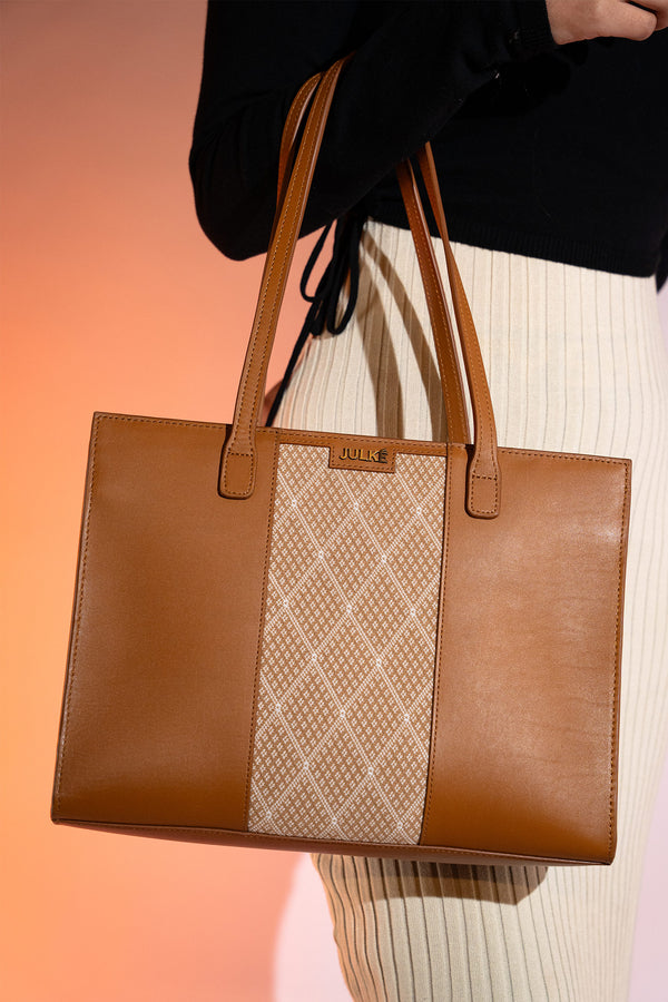 Women's leather tote bag medium size in brown colour with diamond pattern fabric strip and detachable shoulder strap by JULKE. 