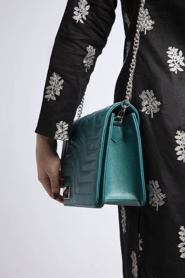 Women leather shoulder bag in turquoise teal colour with quilting by JULKE