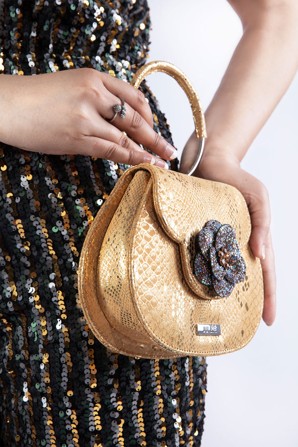 Womens leather bag in gold colour with snake print by JULKE