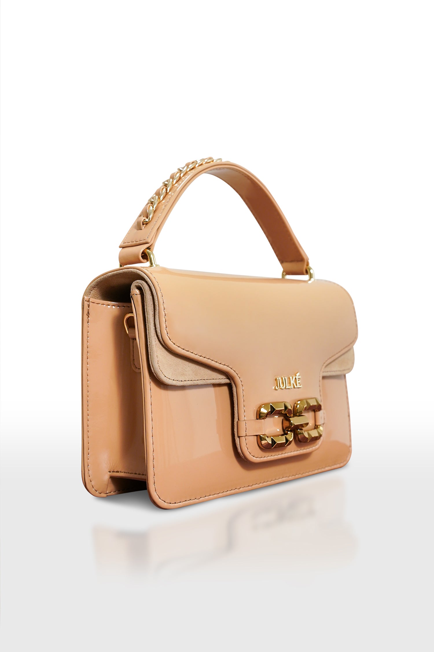 Women's leather top handle shoulder bag in beige coloured patent and suede with golden chain and buckle brooch by JULKE
