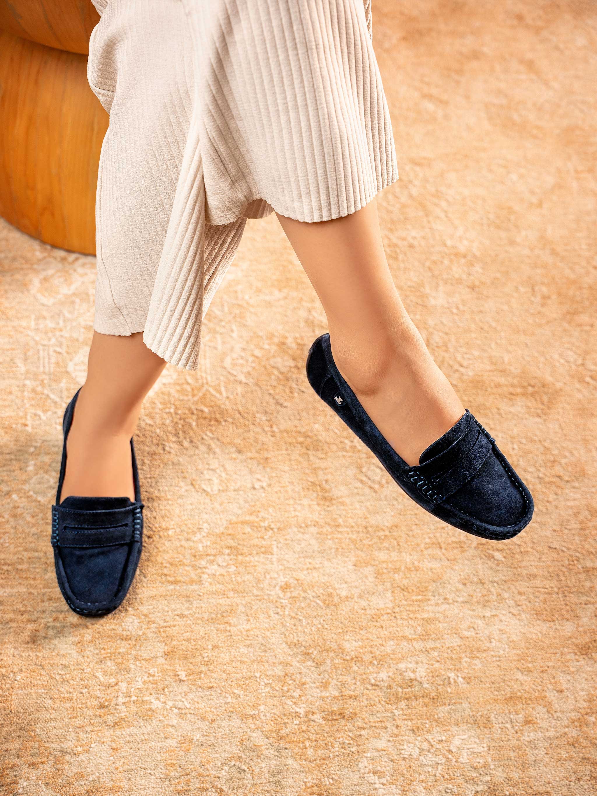 Women's winter suede leather moccasins in dark blue colour with metal logo trim and moc toe by JULKE 