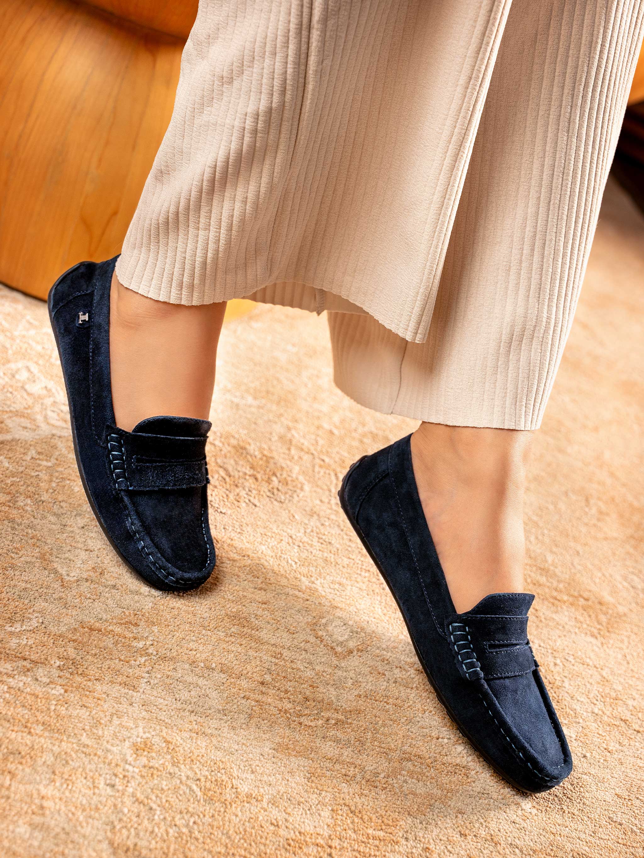 Women's winter suede leather moccasins in dark blue colour with metal logo trim and moc toe by JULKE 