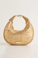 Women's leather mini halfmoon bag in gold colour with 3d reptile texture and unique clip-on handle by JULKE 