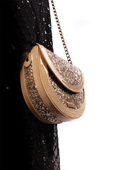 Womens leather round shoulder bag in beige colour with glitter, glossy patent and gold chain by JULKE 