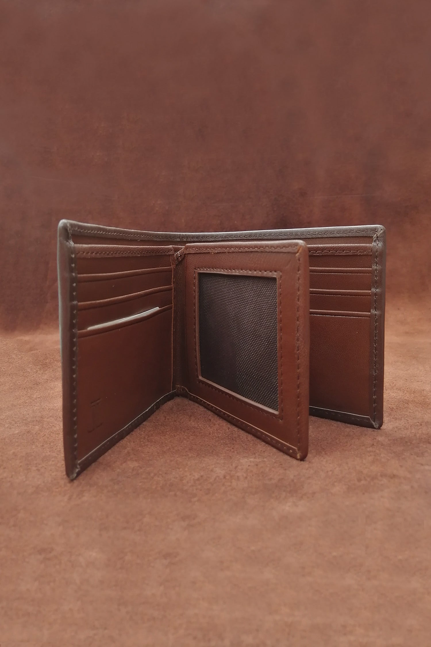 Mens leather bifold wallet in dark brown colour with contrast stitching and gold metallic brand trims by JULKE