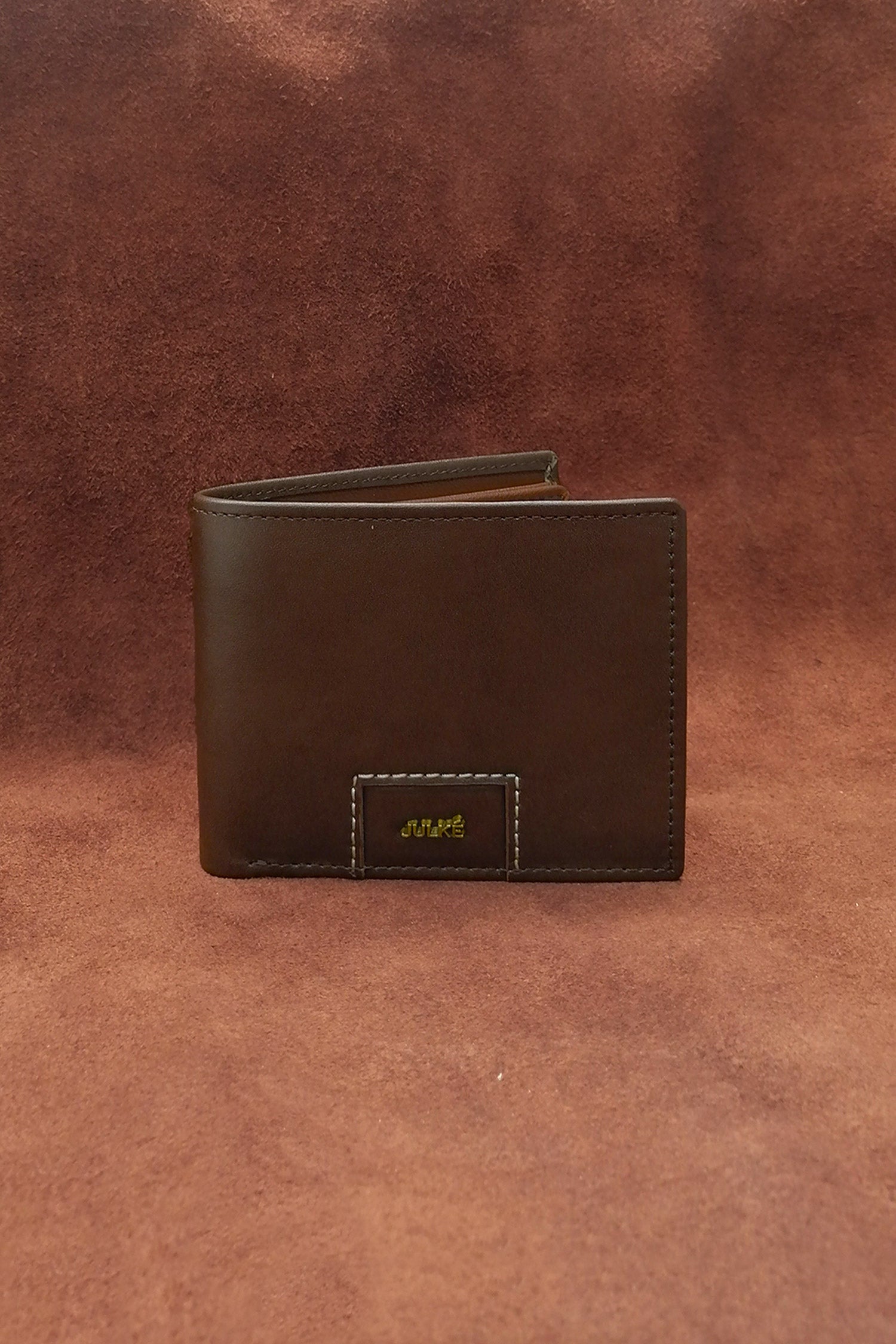 Mens leather bifold wallet in dark brown colour with contrast stitching and gold metallic brand trims by JULKE