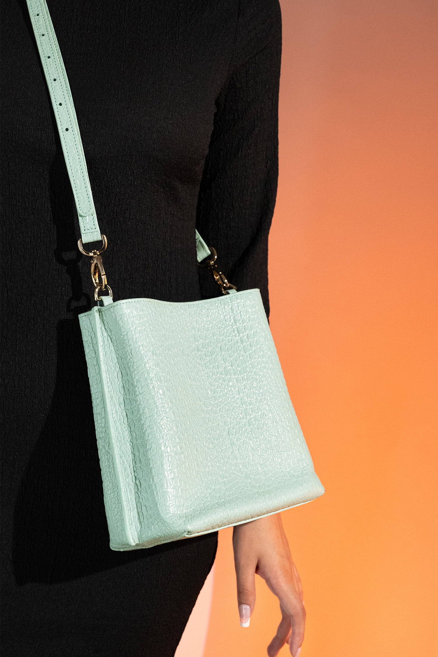 Women's leather bucket bag in mint blue colour with 3D texture and detachable shoulder strap by JULKE