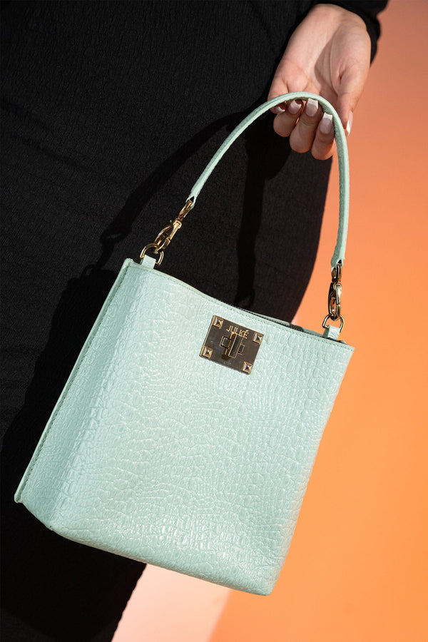 Women's leather bucket bag in mint blue colour with 3D texture and detachable shoulder strap by JULKE