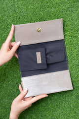 Womens leather accessory wallet in grey colour in patent material by JULKE