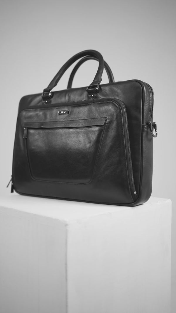 Mens leather laptop bag in black colour with top handle and extra pockets by JULKE